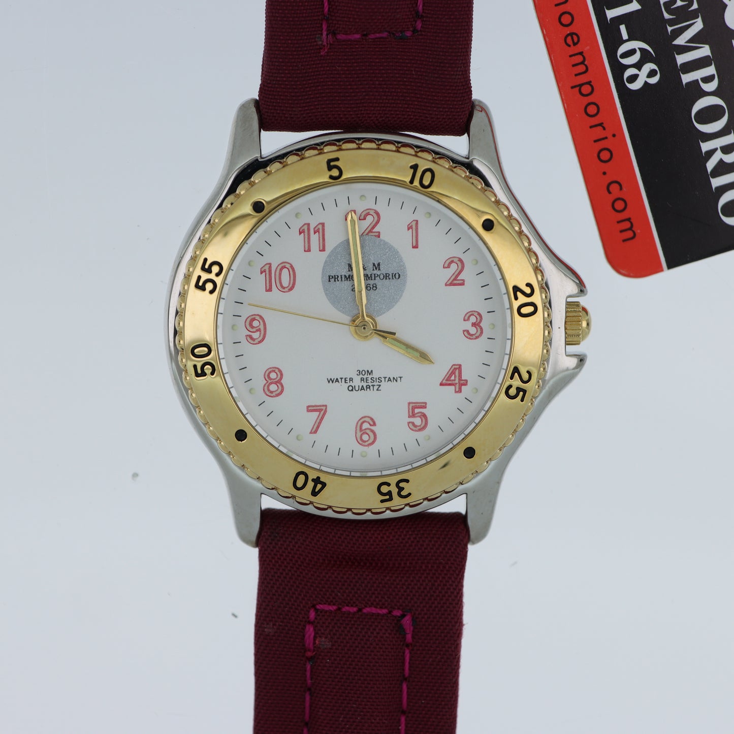 M.&M. Primo Emporio 21-68 – Orologio Uomo Sport Bezel Dorato Numeri Rossi Cinturino Tessuto 30M