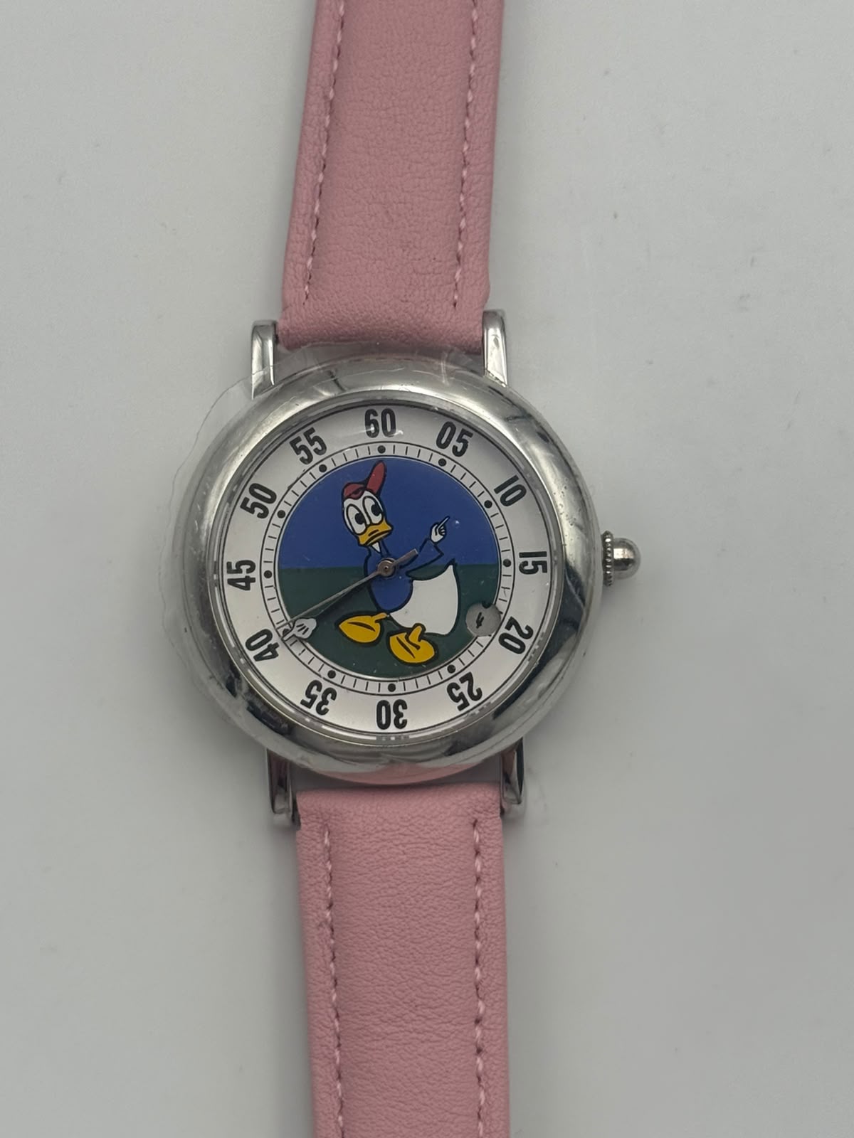 Orologio Paperino al quarzo con cinturino rosa e quadrante illustrato