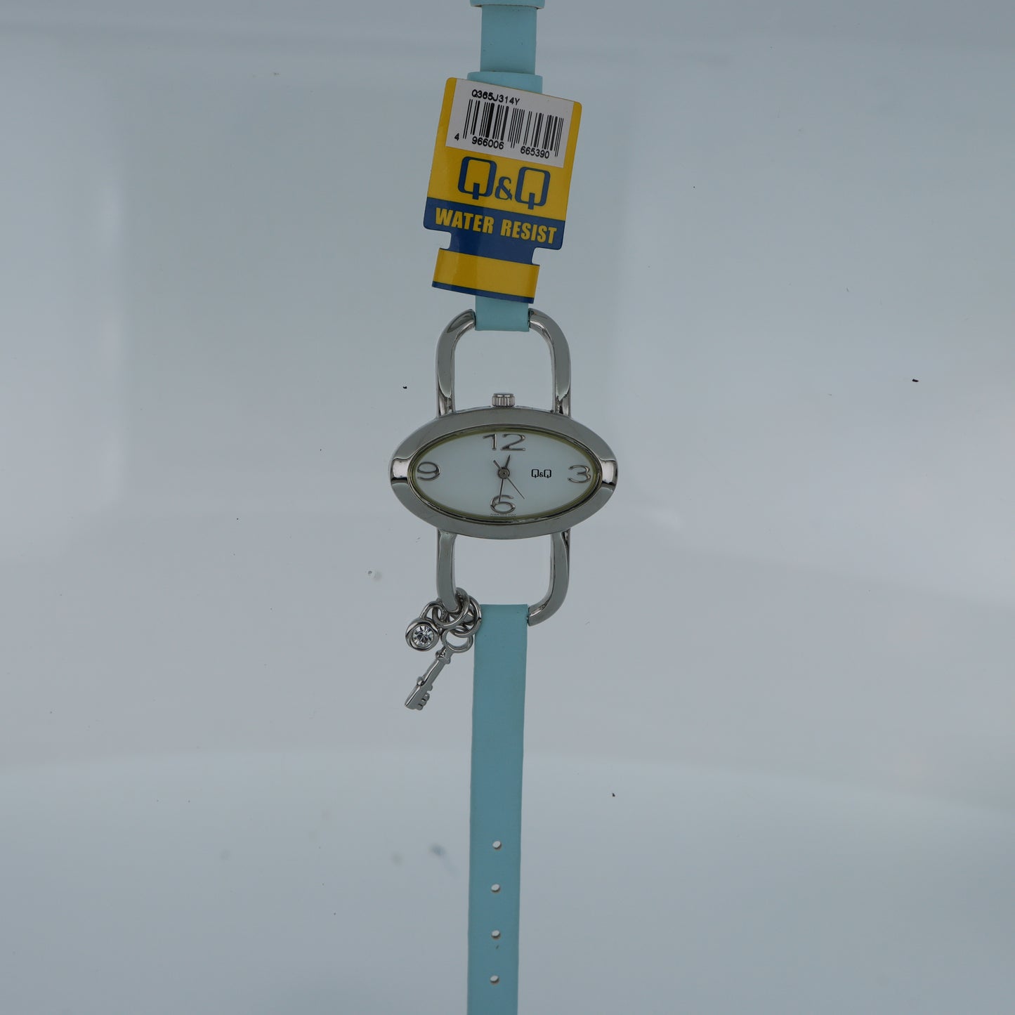 Q&Q – Orologio Donna Cassa Ovale Azzurro Ciondolo Chiave Cristallo