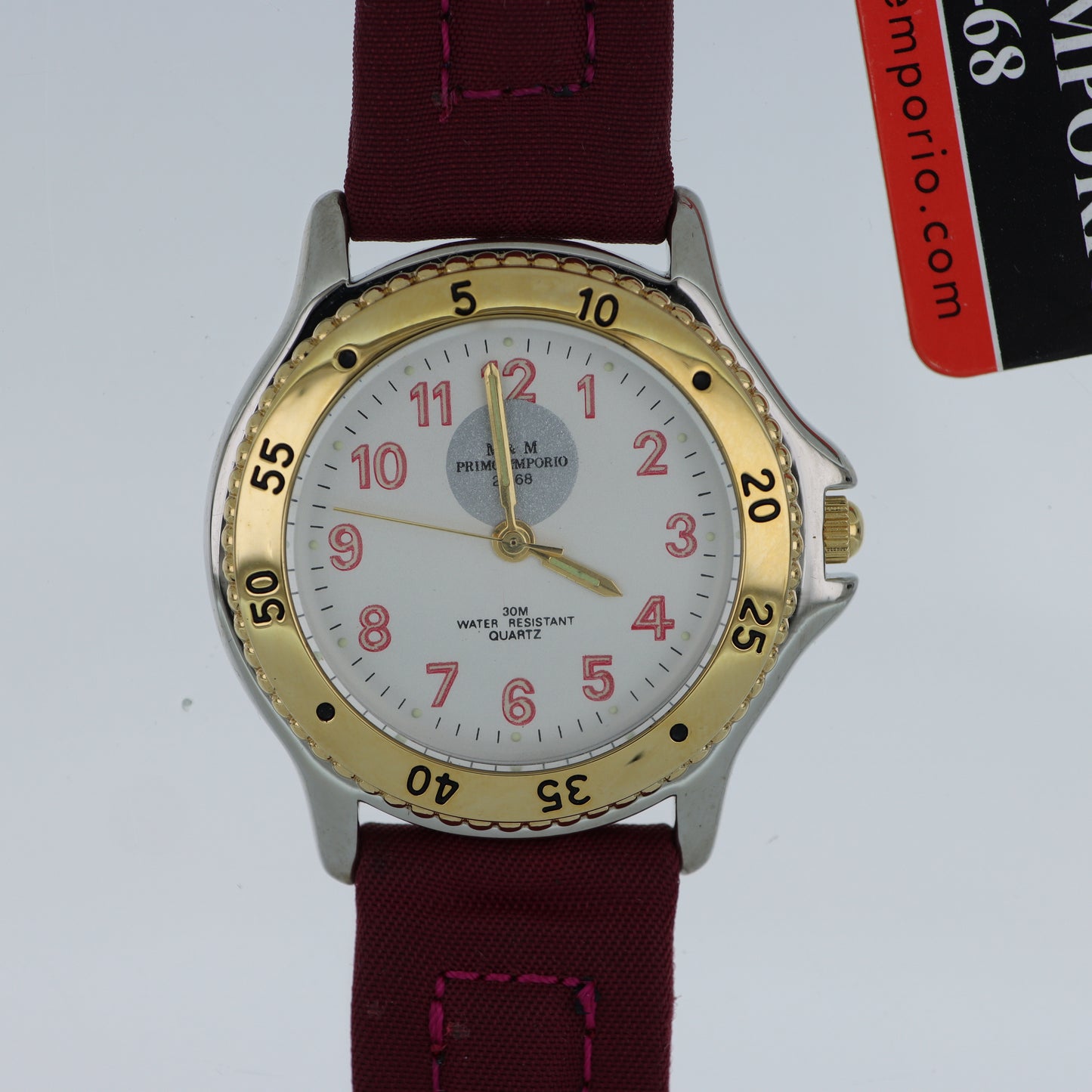 M.&M. Primo Emporio 21-68 – Orologio Uomo Sport Bezel Dorato Numeri Rossi Cinturino Tessuto 30M