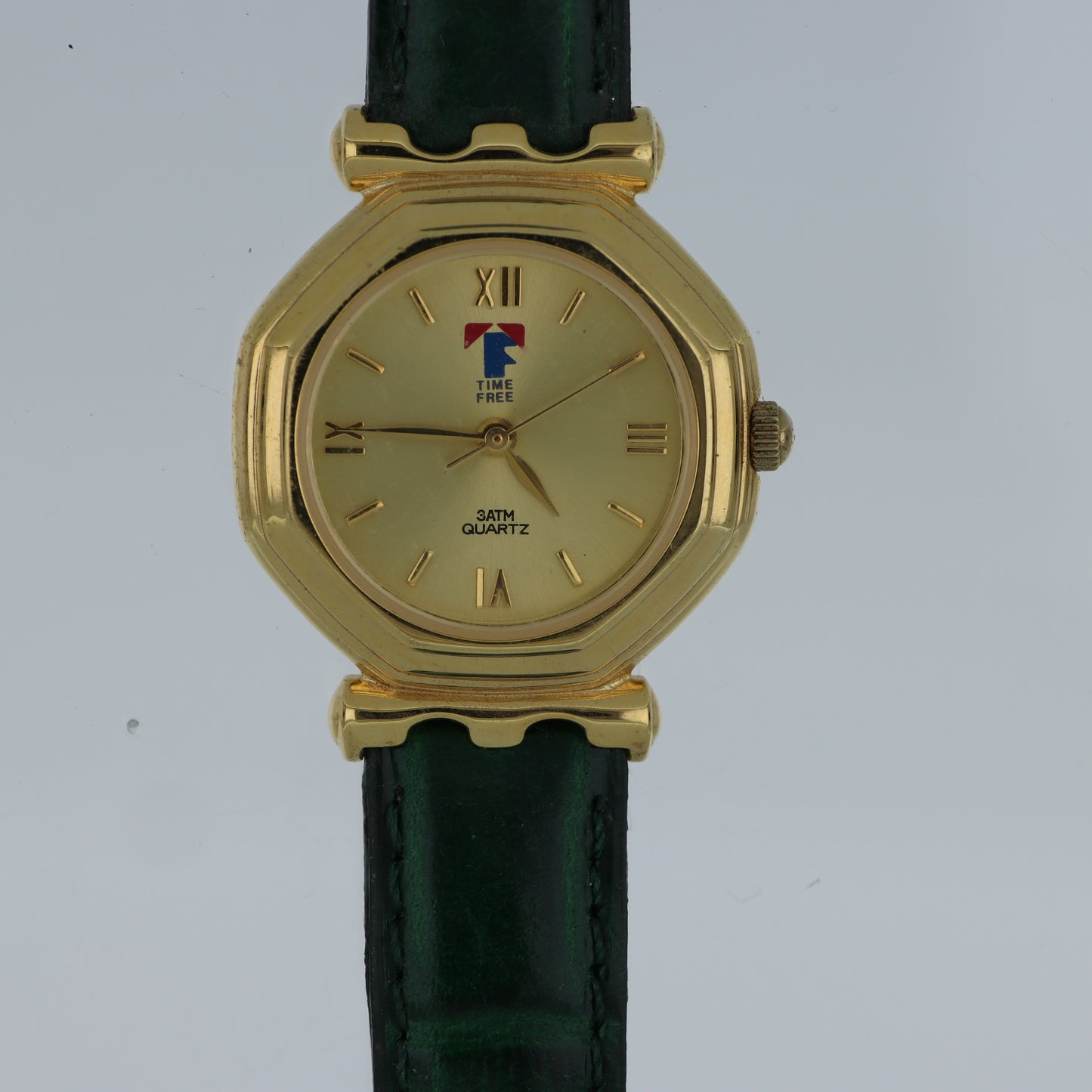 Time Free – Orologio Unisex Cassa Ottagonale Oro Quadrante Champagne Numeri Romani Cinturino Verde 3ATM
