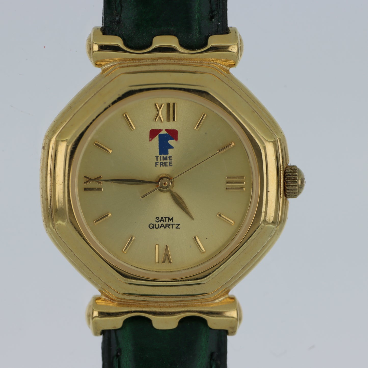 Time Free – Orologio Unisex Cassa Ottagonale Oro Quadrante Champagne Numeri Romani Cinturino Verde 3ATM