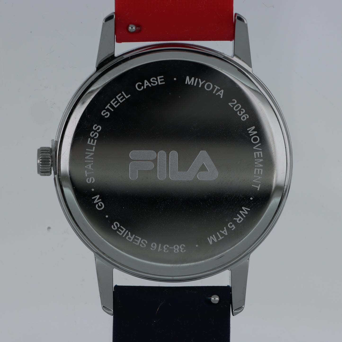 FILA Orologio Unisex – Maxi Logo Quadrante Bianco Cinturino Bicolore Rosso e Blu