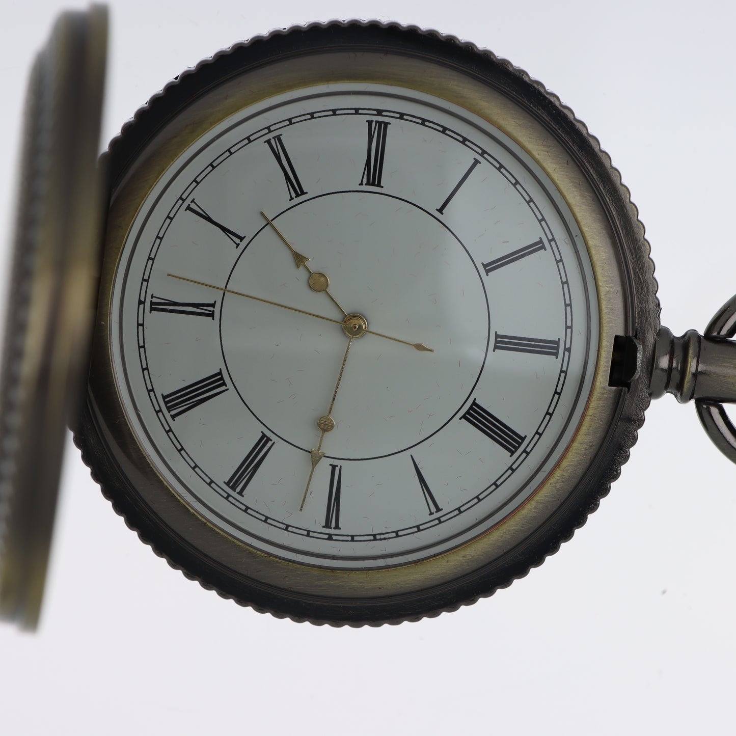 Orologio da Tasca Hunter-Case – Bronzo Antico con Incisioni Arabescate
