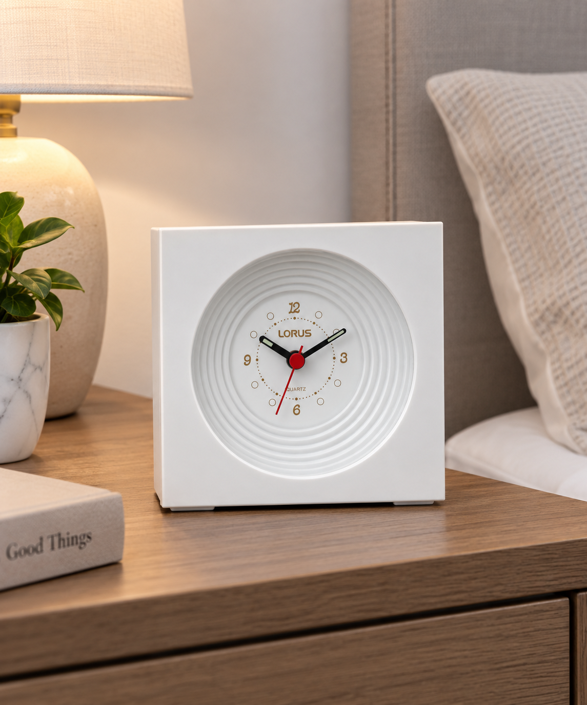 Orologio da tavolo Lorus bianco al quarzo con quadrante a cerchi concentrici e lancetta rossa