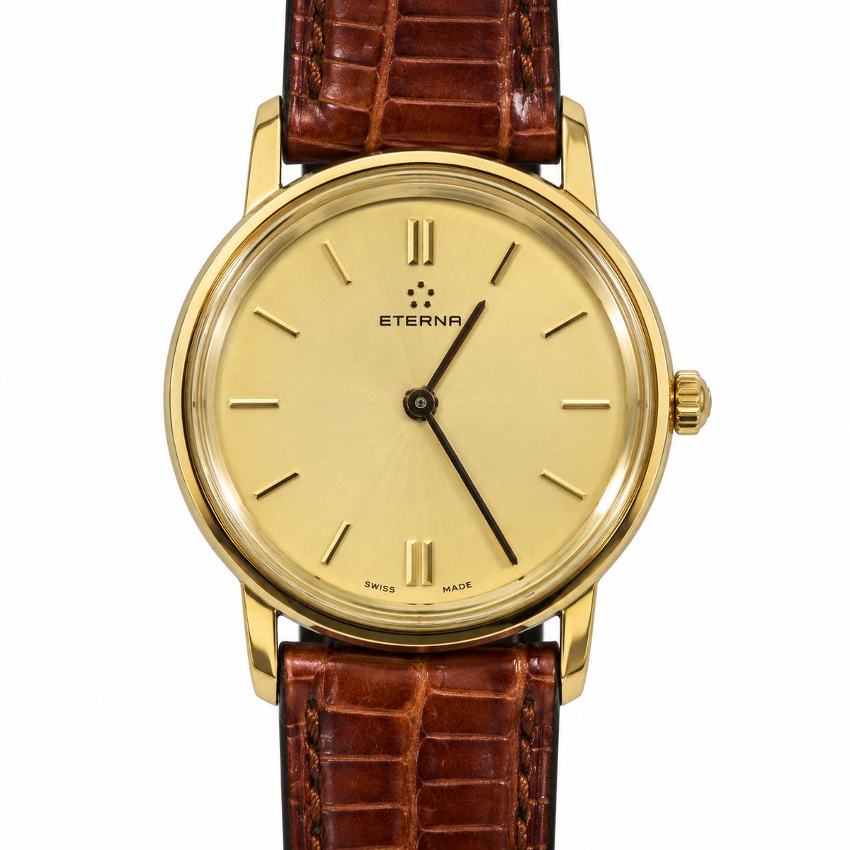 Orologio Eterna in oro giallo con quadrante champagne e cinturino in pelle marrone effetto coccodrillo
